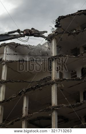 Demolition Pulveriser Demoliting Building In The City