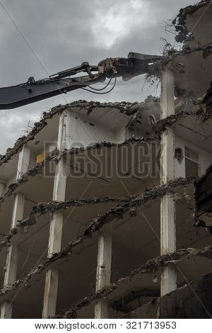 Demolition Pulveriser Demoliting Building In The City