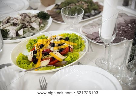 Close Up Of Food And Water Glasses At Restaurant