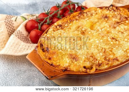 Traditional Italian Cannelloni With Vegetables, Minced Meat And Cheese. On A Wooden Background. Top 