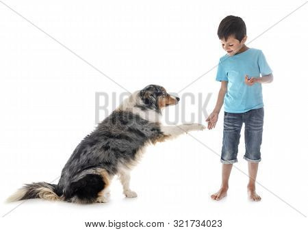 Child And Dog In Font Of White Background