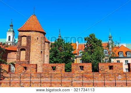 Warsaw, Poland Barbican Or Barbakan Fortified Xvi Century Outpost With The Defense Walls In Historic