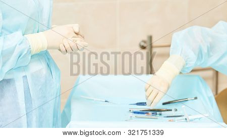 Ophthalmology Laser Microscope Operation. Clinic Room With Doctor And Parient. Gloves And Medicine T