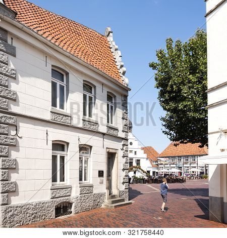 Lingen, Germany, 27 August 2019: Boy Near Market Place Of German Town Lingen In Lower Saxony On Sunn