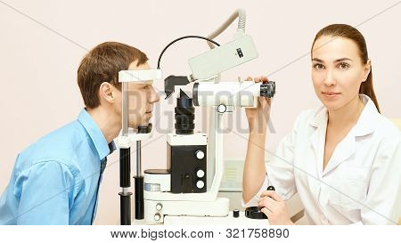 Eye Ophthalmologist Exam. Eyesight Recovery. Astigmatism Check Concept. Ophthalmology Diagmostic Dev