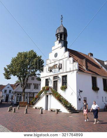 Lingen, Germany, 27 August 2019: Two Women Near Old Town Hall Of Lingen In German Town Off Lower Sax