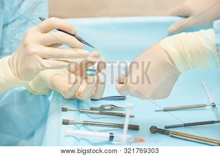 Ophthalmology Laser Microscope Operation. Clinic Room With Doctor And Parient. Gloves And Medicine T
