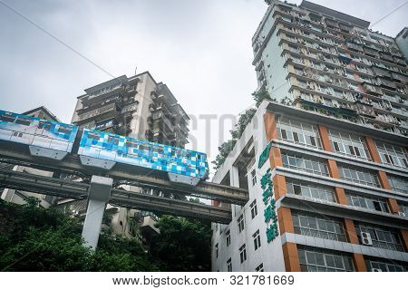 Chongqing China, 7 August 2019 : Chongqing Metro Train About To Enter Liziba Station Famous For Bein