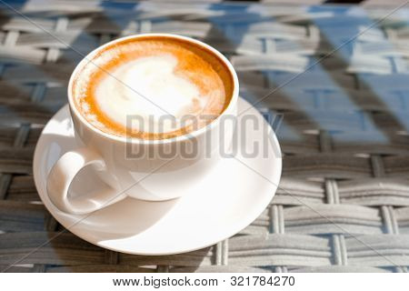 Cappuccino In White Cup On Table At Cafe. Copyspace. Bewerages, Coffee Lovers And Morning Menu Conce