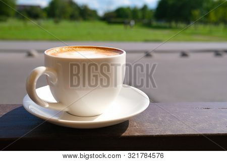 Cappuccino In White Cup On Sunlight At Cafe. Copyspace. Bewerages, Coffee Lovers And Morning Menu Co