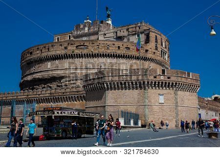 Rome, Italy - April, 2018: Tourists At The Beautiful Mausoleum Of Hadrian Also Called Sant Angelo Ca