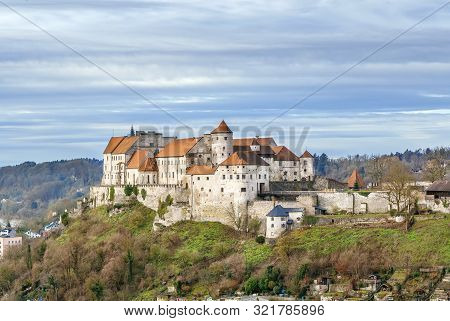 Burghausen Castle On The Hill In Burghausen, Germany. View From The Hill Across Salzach River