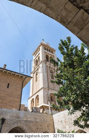 Jerusalem, Israel, September 07, 2019 : View From The Courtyard To The Bell Tower Of The Lutheran Ch