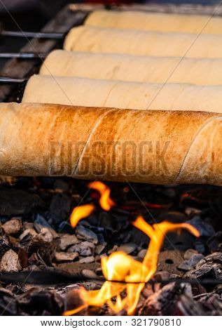 Preparation Of The Famous, Traditional And Delicious Hungarian Chimney Cake Kurtos Kolacs (kürtőskal
