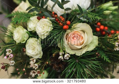 Close Up Winter Bridal Bouquet With White Roses, Eustoma, Chrysanthemum, Cone, Pine, Waxflower, Thuj
