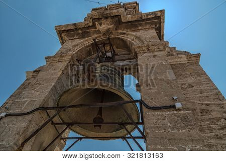 The Huge Bell On The Roof Of Bell Tower (torre Del Micalet) Of The Metropolitan Cathedral Basilica O