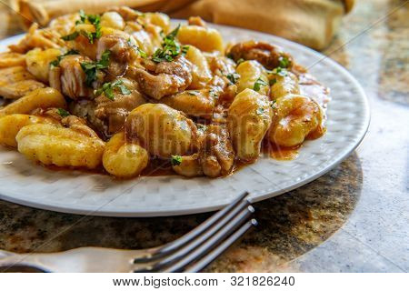 Hungarian Chicken Paprikash With Gnocchi Potato Dumplings And Basil