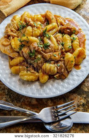 Hungarian Chicken Paprikash With Gnocchi Potato Dumplings And Basil