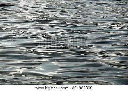 Wave Pattern On The Water, Refelecting Light And Shadows, Real Picture