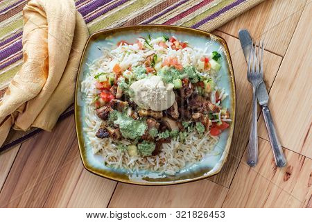Authentic Middle Eastern Chicken Shawarma Rice Platter With Hummus And Side Salad