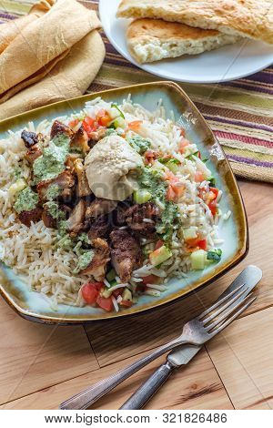 Authentic Middle Eastern Chicken Shawarma Rice Platter With Hummus And Side Salad