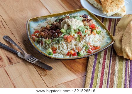 Authentic Middle Eastern Chicken Shawarma Rice Platter With Hummus And Side Salad