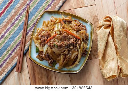 Stir Fried Chinese Beef Chow Fun With Hor Fun Wide Rice Noodles Cabbage And Carrots