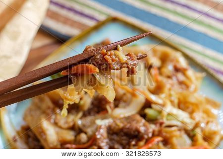 Stir Fried Chinese Beef Chow Fun With Hor Fun Wide Rice Noodles Cabbage And Carrots