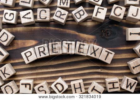 Word Pretext Composed Of Wooden Cubes With Letters, Part Of Speech Concept Scattered Around The Cube