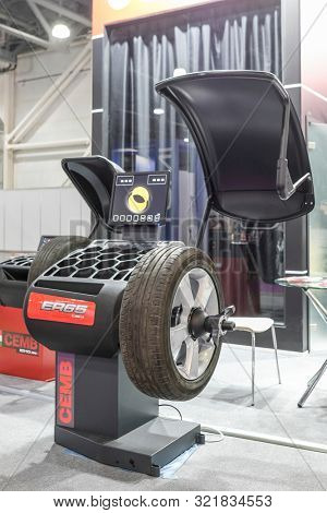 Mosocw, Russia - September, 6, 2019: the image of a tyre repair machine in a car repair station in Mosocw, Russia