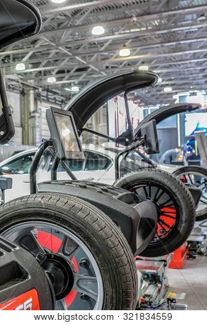 Mosocw, Russia - September, 6, 2019: the image of a tyre repair machine in a car repair station in Mosocw, Russia
