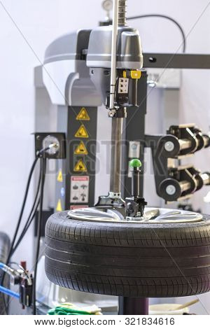 Mosocw, Russia - September, 6, 2019: the image of a tyre repair machine in a car repair station in Mosocw, Russia
