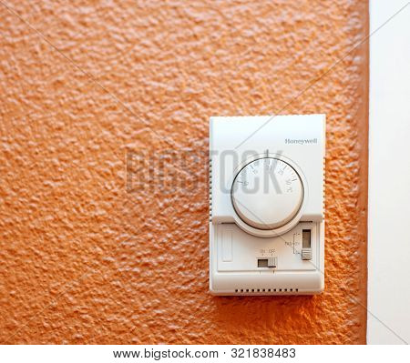 Paris, France - Jul 14, 2011: Hotel Thermostat Regulator With Honeywell Logotype And Settings For Fa
