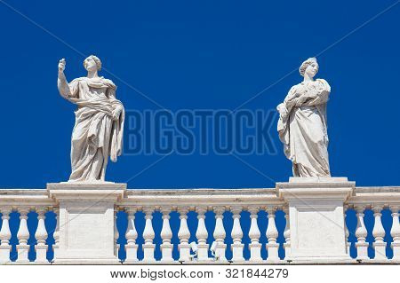 Detail Of The Statues Of Saints That Crown The Colonnades Of St. Peter Square Built On 1667 On The V