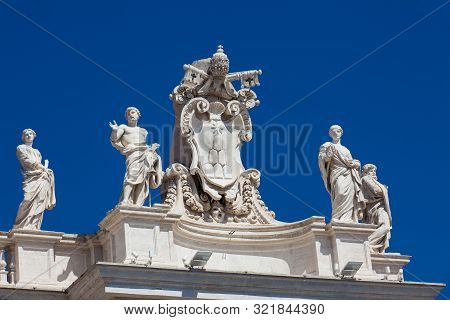 Detail Of The Chigi Coats Of Arms And The Statues Of Saints That Crown The Colonnades Of St. Peter S