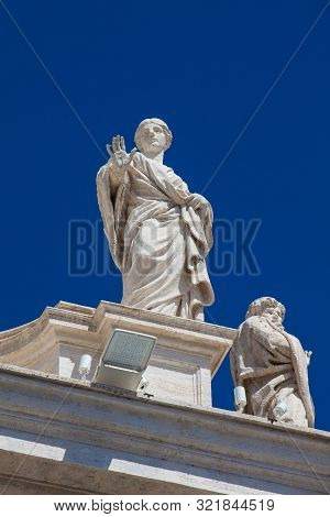 Detail Of The Statues Of Saints That Crown The Colonnades Of St. Peter Square Built On 1667 On The V