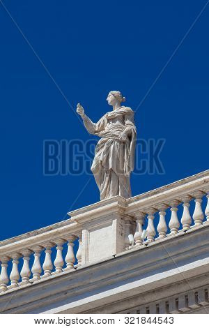 Detail Of The Statues Of Saints That Crown The Colonnades Of St. Peter Square Built On 1667 On The V