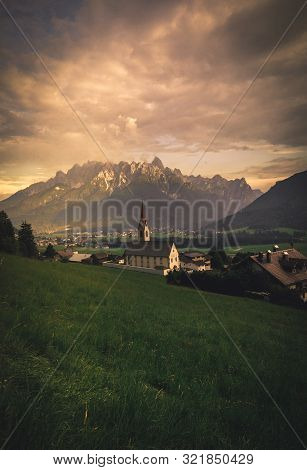View Of Dobbiaco Lake And Surrounding Mountains. Dolomites, Italy
