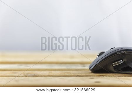 Office Concept. Close Up Head Mouse On Wood Table And White Background With Copy Spce For Text Or De
