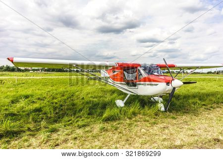 KALININGRAD, Russia - August 18, 2019: 100 Anniversary First European Airport Devau Fest, Ultra Light Propeller Screw Plane Ready for Flight