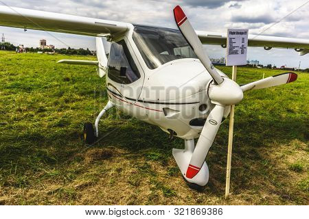 KALININGRAD, Russia - August 18, 2019: 100 Anniversary First European Airport Devau Fest, Ultra Light Propeller Screw Plane Ready for Flight