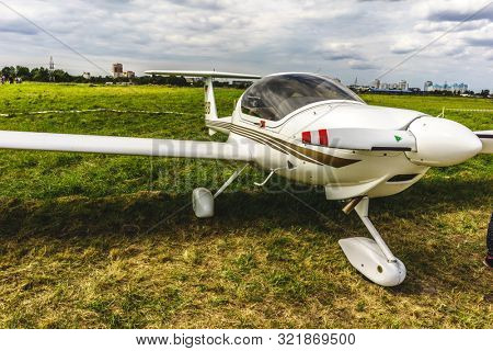 KALININGRAD, Russia - August 18, 2019: 100 Anniversary First European Airport Devau Fest, Ultra Light Propeller Screw Plane Ready for Flight