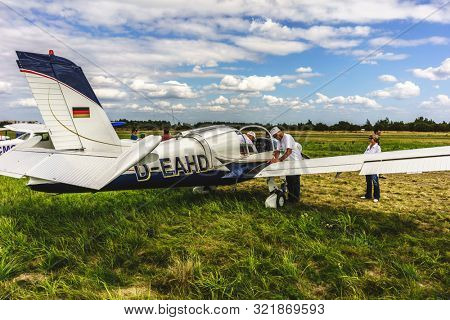 KALININGRAD, Russia - August 18, 2019: 100 Anniversary First European Airport Devau Fest, Ultra Light Propeller Screw Plane Ready for Flight