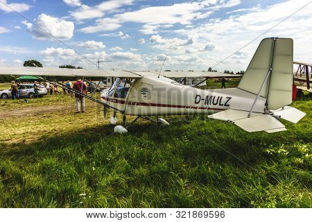 KALININGRAD, Russia - August 18, 2019: 100 Anniversary First European Airport Devau Fest, Ultra Light Propeller Screw Plane Ready for Flight