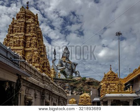 Shiva Statue And Gopuram Tower On The Coast Of The Arabian Sea In Murdeshwar, India