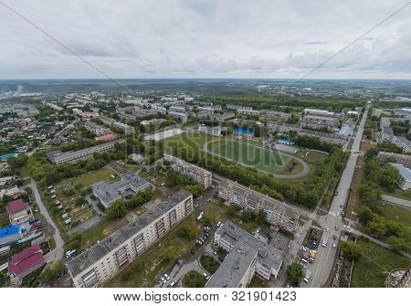 Stadium In Sukhoy Log City. Aerial, Summer, Cloudy Day