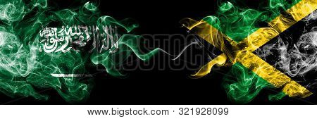 Saudi Arabia Kingdom Vs Jamaica, Jamaican Smoky Mystic Flags Placed Side By Side. Thick Colored Silk