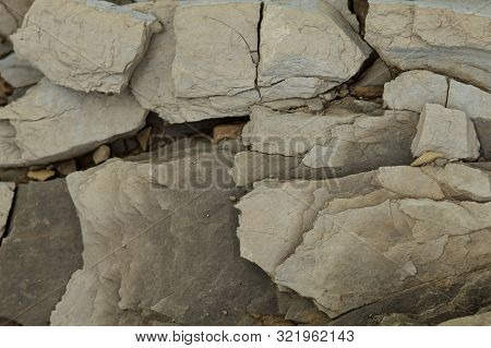 Rock Layers. Large Coarse Layers Of Stone. Large Gray Stones