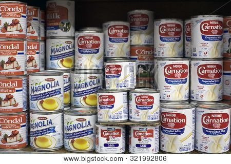 Bronx, New York/usa - May 6, 2019: Store Shelf Of Evaporated And Condensed Milk By Various Brands.