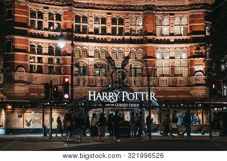 London, Uk - August 31, 2019: People Walking In Front Of Harry Potter And The Cursed Child Sign At T
